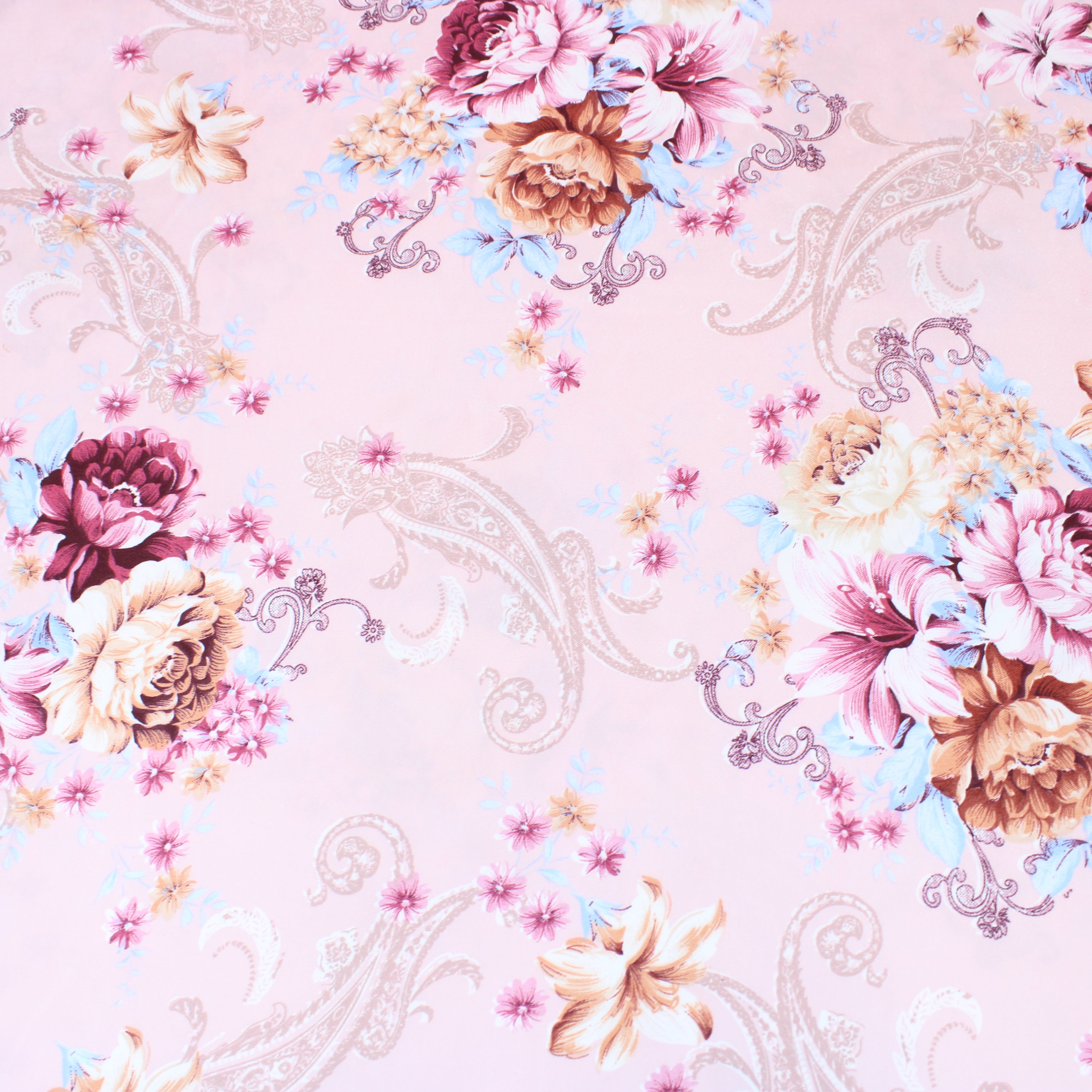 A closeup shot of a luxury-brushed cotton sateen fabric with a floral print.