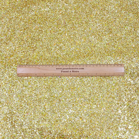 Pound A Metre Cotton Backed Chunky Glitter Fabric- Gold