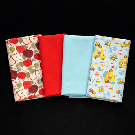 Pound A Metre Fat Quarter Bundle- 4 Pieces Per Bundle- (School Bee)