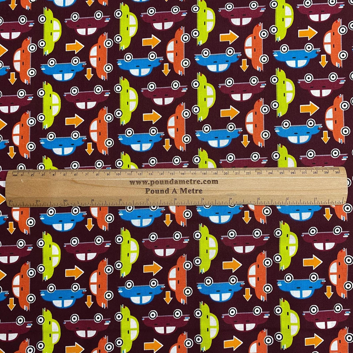 Pound A Metre Per Metre Luxury Printed Cotton – 45" Wide- (Maroon Cars) (EOL)
