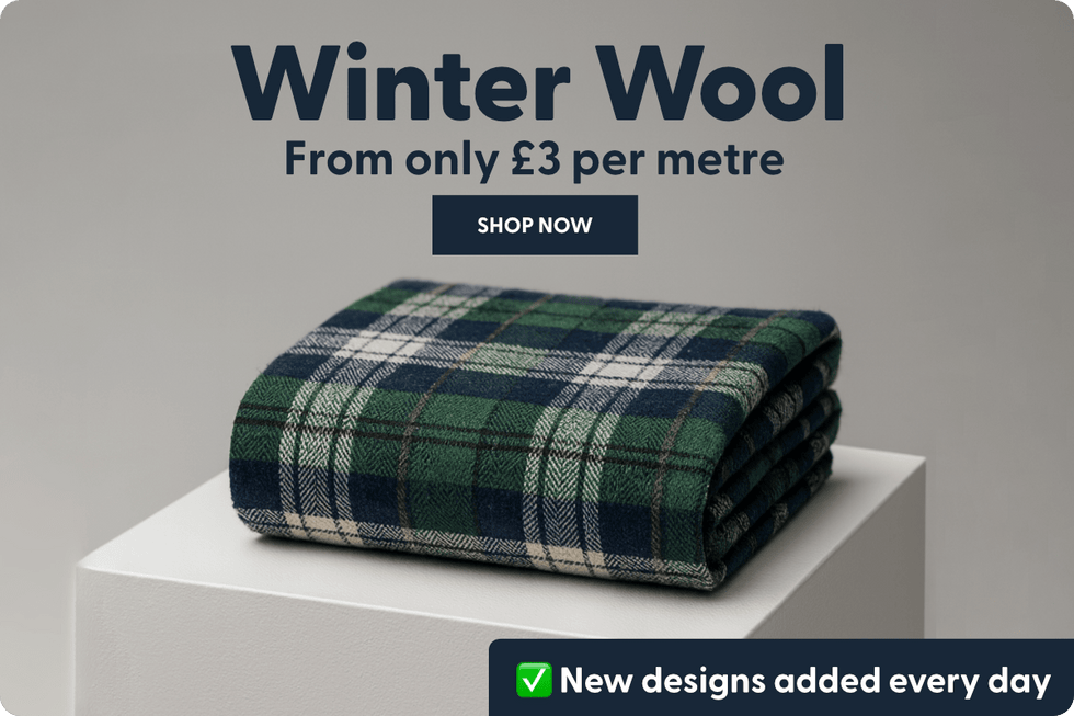 Folded plaid blanket on a white pedestal with promotional text about winter wool and pricing.