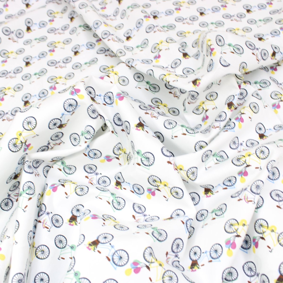 Dressmakers Quality Floral Cotton Poplin - Bicycle - 55" Wide White - Pound A Metre