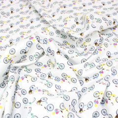 Dressmakers Quality Floral Cotton Poplin - Bicycle - 55" Wide White - Pound A Metre