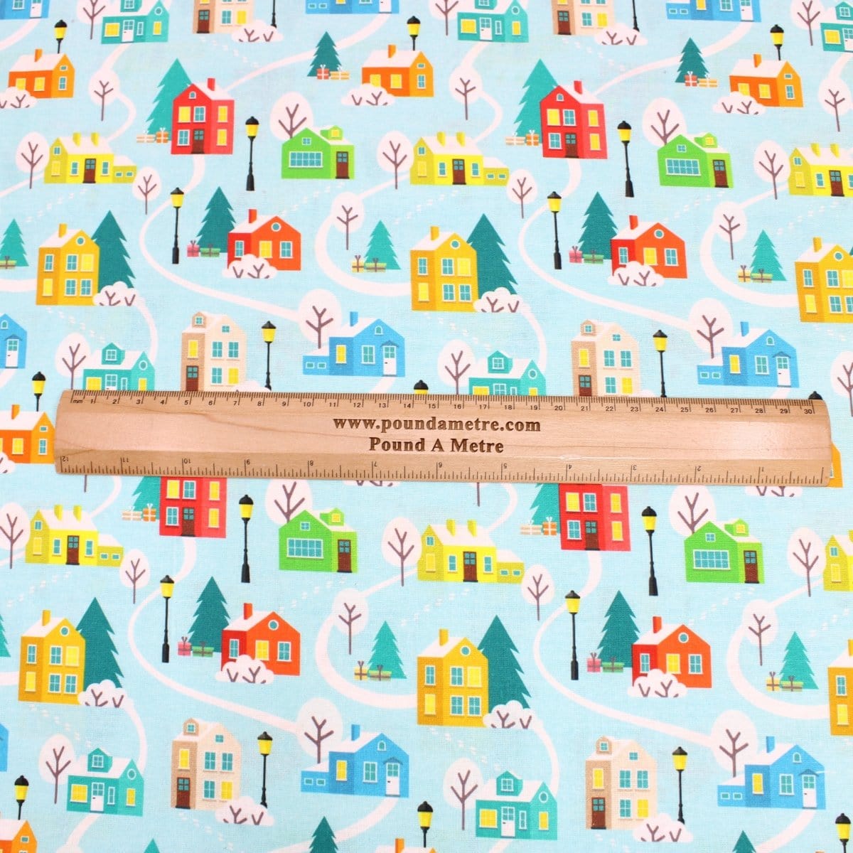Pound A Metre Full Metre Festive Quilting Cotton 44" Wide Snow House - Light Blue