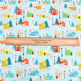 Pound A Metre Full Metre Festive Quilting Cotton 44" Wide Snow House - Light Blue
